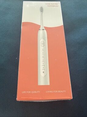 Sonic Electric Toothbrush in White and Coral Packaging new